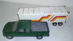 lot 204 image: Menards Trailer, Ford Truck. Ford Is By New Ray.