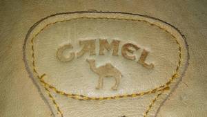 lot 211 image: Camel Leather Backpack.