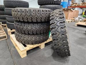 lot 55 image: Lot of (4) Tires on Wolf Paws 500 Rims 7.5x16LT (New)