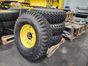 lot 56 image: Lot of (4) Snow Wolf 9.00-16LT Tires on WolfPaws 400 Rims LWP87 (New)