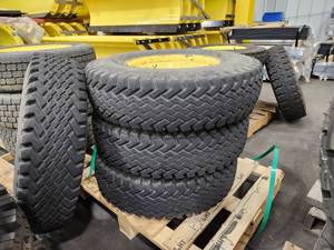 lot 57 image: Lot of (4) 7.50-16LT Tires on WolfPaws 100 Rims