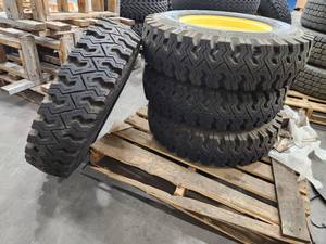 lot 58 image: Lot of (4) 7.0-15LT Tires on WolfPaws 300-655 Rims (New)