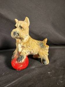 lot 11 image: Vintage Chalkware Scottie Dog Playing with Red Ball