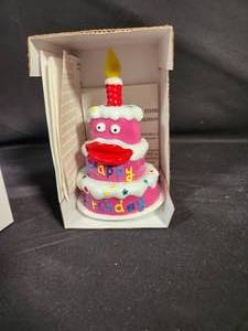 lot 18 image: Singing, Dancing Happy Birthday Cake