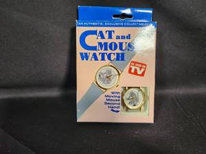 lot 21 image: Authentic Collectible As Seen on TV Cat and Mouse Watch