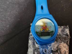 lot 39 image: 2002 Bart Simpson Kelloggs Promotional Holographic Wristwatch