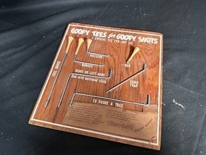 lot 90 image: 1952 Wooden Sign Goofy Tees for Goofy Shots Gag Gift - a Special Tee for any Lie