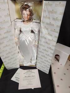 lot 80 image: The Ashton-Drake Galleries Porcelain Doll Titled Her Mothers Pearls