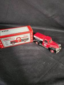 lot 94 image: Lennox 1940 Ford Ultra Edition Pickup 100 Years Die Cast Collectors Bank
