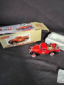 lot 95 image: Lennox 1930s Studebaker Pickup with Custom Load Die Cast Bank - New in Box