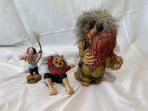 lot 172 image: 2012 Nyform Troll Couple Dancing from Norway, Little Boy Laughing Troll Boy & Golfing Troll