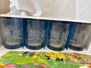 lot 174 image: Super Bowl XXVI Redskins Vs Bills Commemorative Rocks Glasses NIB and Set of 1976 Burger King Leroy Nieman Olympics Posters