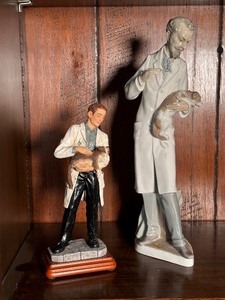 lot 183 image: Lladro Veterinarian Porcelain Figurine and Vanmark Vererinarian Healing Hands Figurine