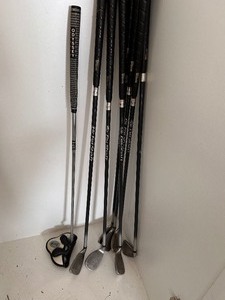 lot 221 image: Lot of Golf Clubs