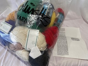 lot 119 image: Bag of Yarn and Christmas Stocking Knit them Big and Bright Pattern