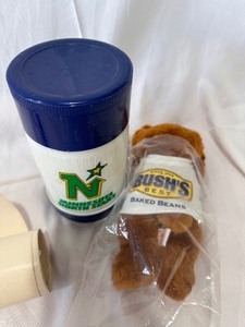 lot 140 image: Minnesota Northstars Thermos, Bushs Best Baked Beans Bear, and 1992 Minnesota Gophers Basketball Coaches Got Milk Campaign Poster