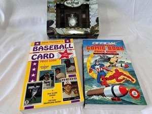 lot 141 image: The Official Comic Book Price Guide No. 21, Baseball Price Guide 4th Edition, and New Safari Watch Set