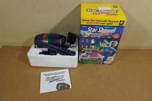 lot 144 image: As Seen on TV Star Shower Motion Laser Light