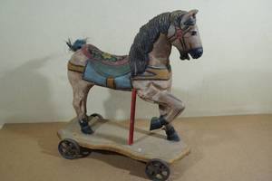 lot 176 image: Vintage Horse Pull Toy with Steel Wheels