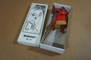 lot 238 image: Vintage Tin Litho Climbing Monkey