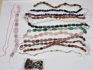 lot 16 image: Gemstone Bead Mix #2 Beads on a 16 inch string for jewelry making. Includes 16 strands of various Jasper, Agate, Jade, calcite Quartz, Amethyst and Opal.