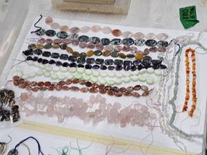 lot 17 image: Gemstone Bead Mix #3 Beads on a 16 inch string for jewelry making. Includes 19 strands of various Jasper, Agate, calcite, Aquamarine, Chrysocolla, Quartz, Amethyst, opal and rose quartz.