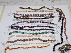 lot 20 image: Gemstone Bead Mix #6 Beads on a 16 inch string for jewelry making. Includes 19 strands of various Jasper, Agate, Jade, calcite, Aquamarine, Chrysocolla, Quartz, Opal, Amethyst, Lapis and rose quartz.