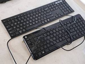 lot 205 image: Computer Keyboards - One USB Wired, One Wireless