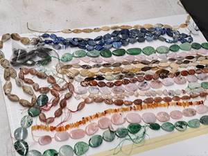 lot 26 image: Gemstone Bead Mix #12 Beads on a 16 inch string for jewelry making. Includes 21 strands of various Jasper, Agate, Jade, calcite, Quartz, Opal, Lapis and rose quartz.