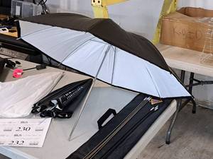lot 229 image: Photoflex Professional Photo Gear 32 Light Umbrella with Case and Assorted Rods