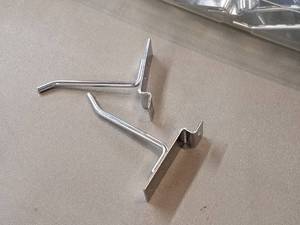 lot 378 image: Lot of (50) 4 Slat Wall Hooks