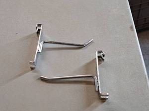 lot 409 image: Lot of (50) 4 Grid Wall Hooks