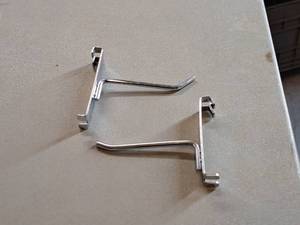 lot 411 image: Lot of (50) 4 Grid Wall Hooks