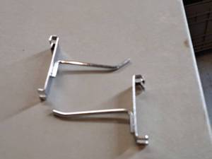 lot 410 image: Lot of (50) 4 Grid Wall Hooks