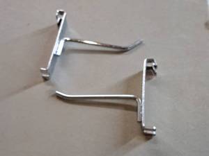 lot 408 image: Lot of (50) 4 Grid Wall Hooks