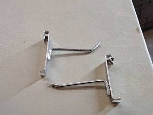 lot 400 image: Lot of (50) 4 Grid Wall Hooks
