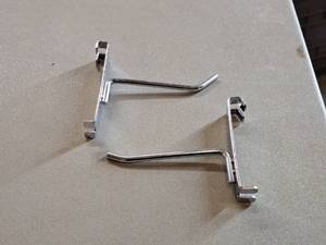 lot 397 image: Lot of (50) 4 Grid Wall Hooks
