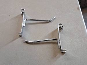 lot 393 image: Lot of (50) 4 Grid Wall Hooks