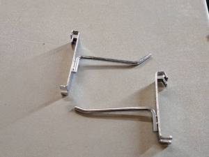 lot 396 image: Lot of (50) 4 Grid Wall Hooks