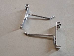 lot 395 image: Lot of (50) 4 Grid Wall Hooks