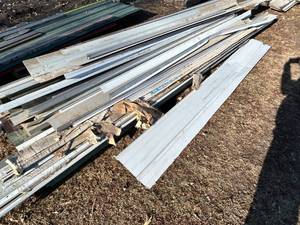 lot 32 image: Stack of Steel Siding - 126 L x 36 W