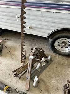 lot 77 image: Cast Iron Stands, Sickle Blade, Steel Sawhorse & Level Lot