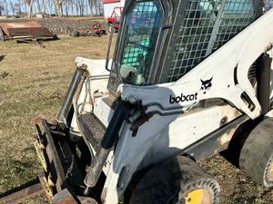 lot 2 image: Bobcat 873 Turbo Diesel Skidloader with Bucket and Forks - NO RESERVE