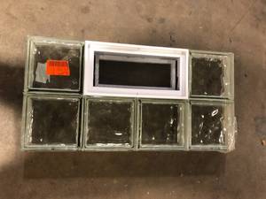 lot 38 image: Clearly Secure 32 in. x 16  in. x 3.125 in. Frameless Ice Pattern Vented Glass Block Window  Customer Returns See Pictures