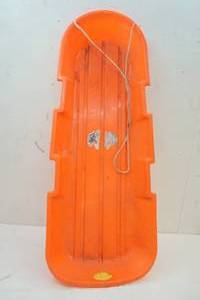 lot 6 image: Orange plastic sled