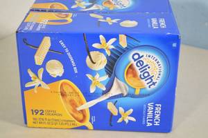 lot 70 image: Case of International Delight French Vanilla Coffee Creamers Best By 07292023