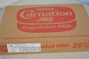 lot 100 image: Case of Nestle Carnation Evaporated Milk 24 5oz Cans Best By 08312023