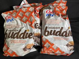 lot 153 image: Chex Mix Muddy Buddies Peanut Butter & Chocolate - 6-Pack Best By 03022024