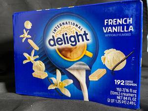 lot 14 image: Delight French Vanilla Coffee Creamers - 192-Pack Best By 07292023
