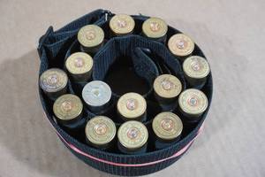 lot 148 image: Nylon Shotshell Bandoleer with Assorted 12 Gauge Slugs and Shotshell